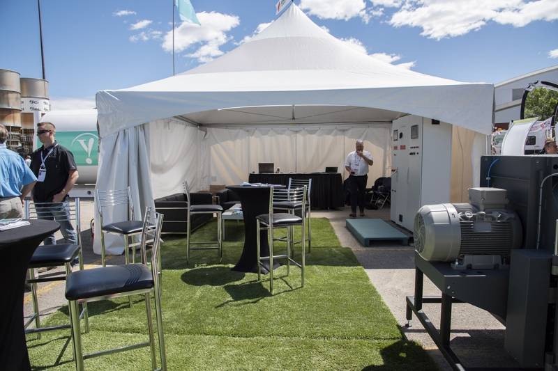 Event Rental Furniture From Superior Show Service Outdoor furniture rental plus synthetic lawn on asphalt. - Event Rental Furniture From Superior Show Service